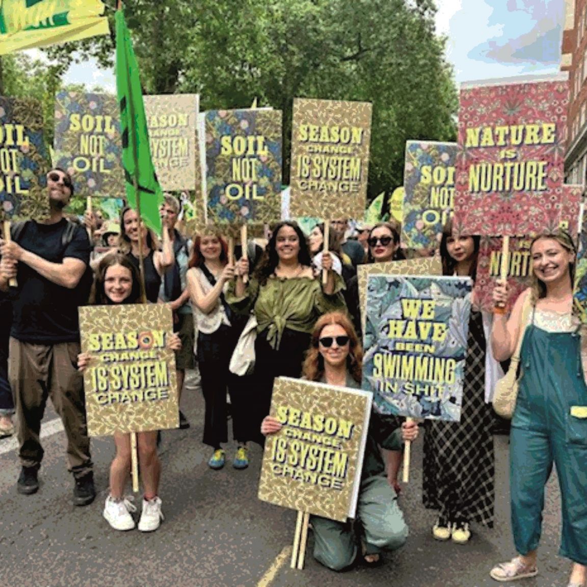The Team at House of Hackney holding their Custom Placards